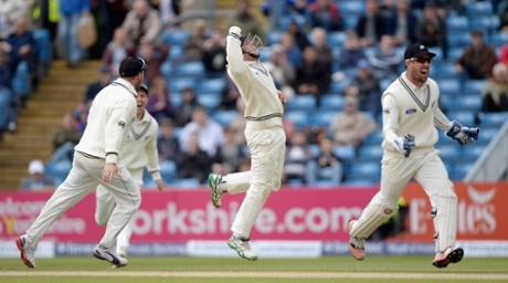 Tom Latham celebrates catching out Joe Root.