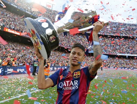 Barcelona's Neymar with the trophy after their La Liga title triumph.