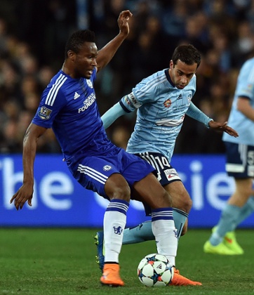 John Obi Mikel fights for the ball with Alex Brosque.