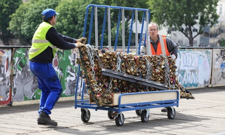 At last! Workers remove padlocks from the Pont des Arts in Paris.