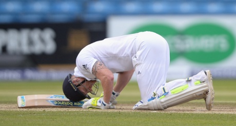 Ben Stokes reacts after being hit in the box by Tim Southee.
