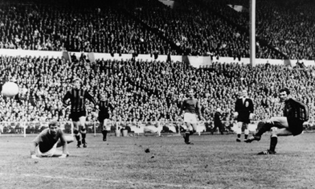 Neil Young, right, scores the winning goal for Manchester City against Leicester City in the 1969 FA Cup final.