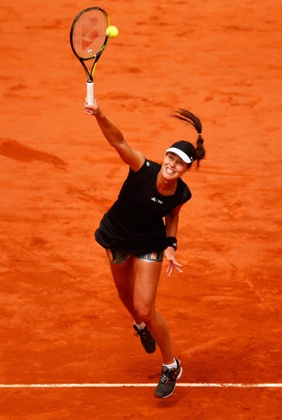 Ana Ivanovic of Serbia serves.
