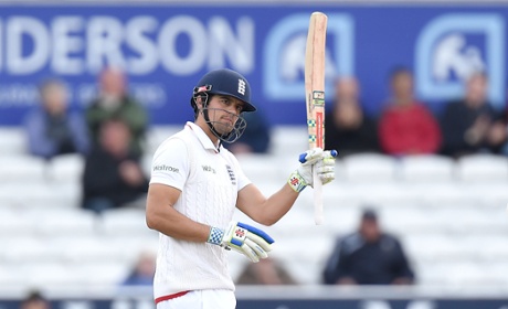 Alastair Cook celebrates making his half century.