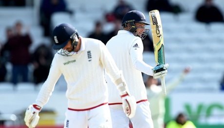 Jos Butler celebrates his half century.