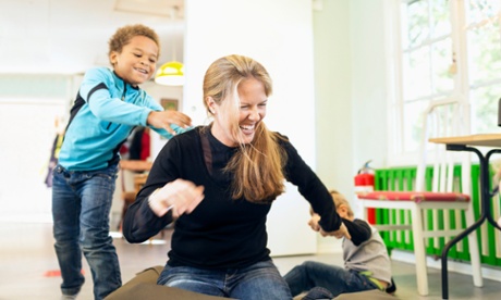 children playing with teacher