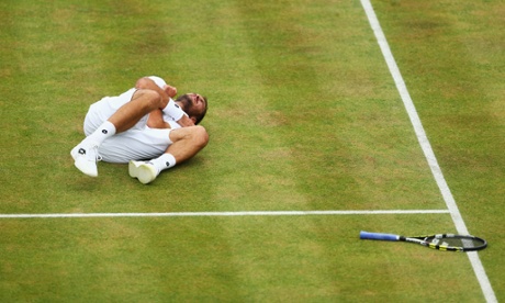 Troicki grimaces after a fall.