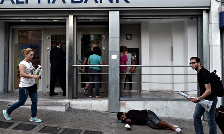 People withdraw cash from ATMs