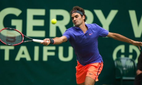 Roger Federer en route to victory against Ivo Karlovic of Croatia in the last four of the Gerry Weber Open in Halle, Germany.