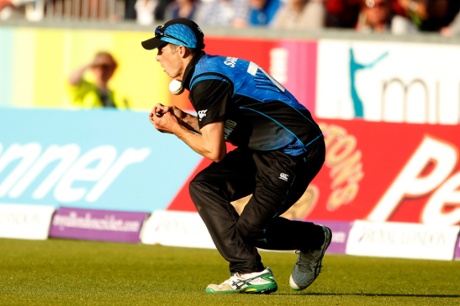 Mitchell Santner drops a good chance.