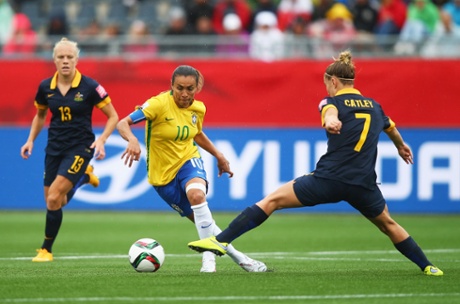 Marta evades Stephanie Catley and Tameka Butt.