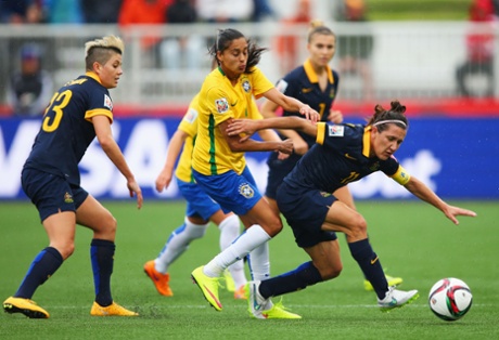 Lisa De Vanna holds off Andressa.