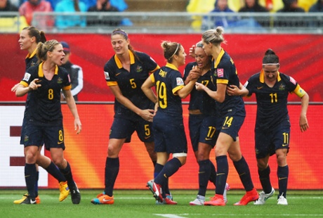Kyah Simon celebrates with team mates as she scores the first goal.