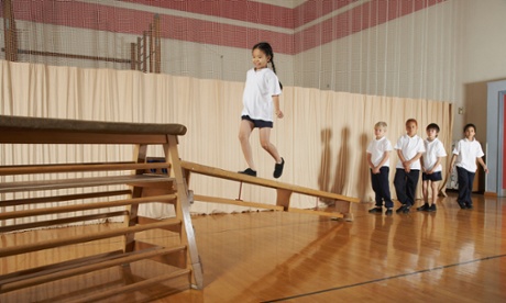 Child on school gym equipment