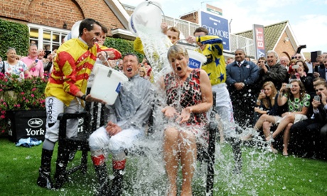 Jockey Frankie Dettori and TV presenter Clare Balding take up the ice bucket challenge