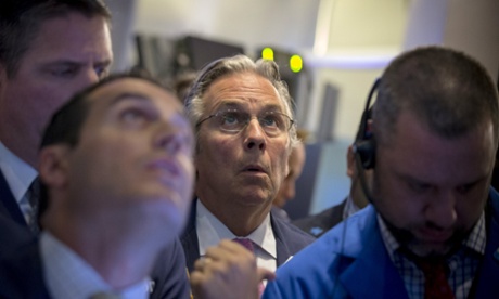 Traders on the floor of the New York Stock Exchange.
