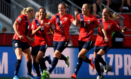 Norway celebrate Solveig Gulbrandsen's goal against England. 