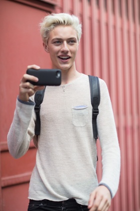 Lucky Blue Smith leaves the Salvatore Ferragamo show.