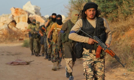 Members of the al-Nusra Front during an offensive to take control of the Syrian city of Ariha from Assad’s forces in May.