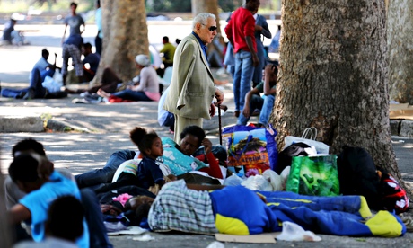 Migrants at the Tiburtina station in Rome