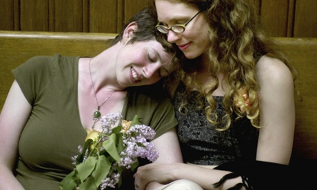 Jes Shuford and Shannon Andrews wait their turn to apply for a marriage licence in the early hours of 17 May 2004 in Cambridge, Massachusetts. 