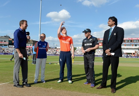 England captain Eoin Morgan tosses the coin alongside Brendon McCullum.
