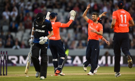 Mark Wood celebrates after bowling Mitchell Santner.