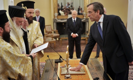 New Democracy party leader Antonis Samaras is sworn in as prime minister during a ceremony at the presidential palace in Athens.