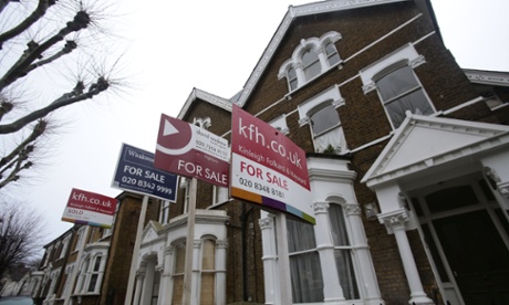 For Sale signs displayed outside houses in Finsbury Park, north London