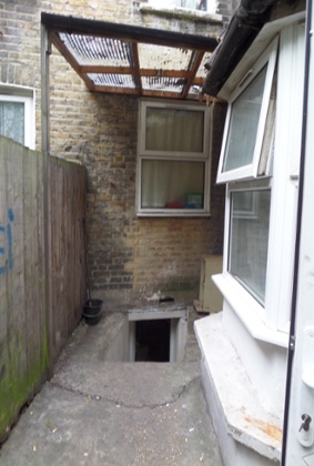 The entrance to the basement from outside