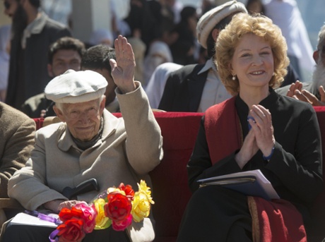 Geoffrey Langlands and Carey Schofield watch a concert performed by students to mark Langlands’ retirement.