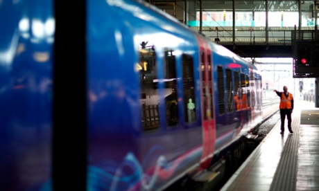 A TransPennine Express service prepares to depart Leeds station for Manchester