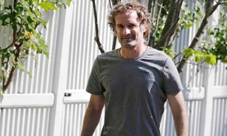 Peter Theo Curtis walks towards reporters to read a statement outside his mother’s home in Cambridge, Massachusetts.