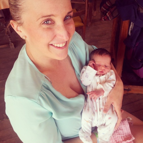 Heather and eight-day-old Francesca, near the Pyramid stage. #glasto2015 #guardianglasto