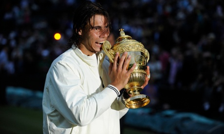 Wimbledon 2008: Rafael Nadal with the Wimbledon men's singles trophy after defeating Roger Federer in an epic match
