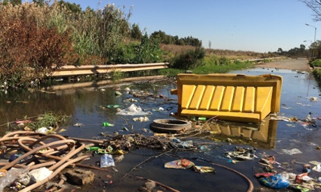 A street in the Riverlea township. Rainy season causes polluted water from Johannesburg’s mine dumps to flood into local water courses.