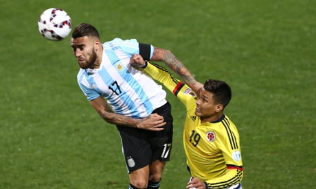 Nicolás Otamendi of Argentina goes for a header with Colombia's Teófilo Gutiérrez Copa América quarter-final.