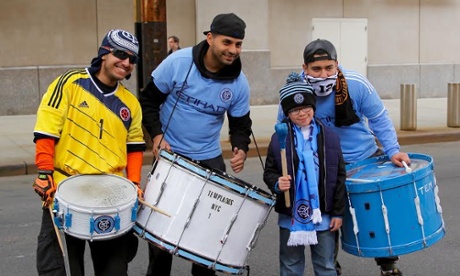 Fans with their shirts and drums