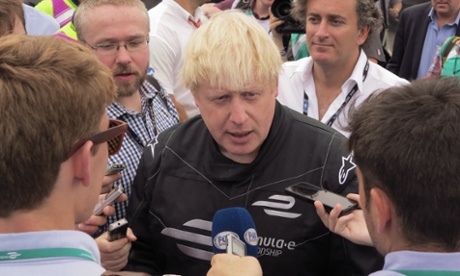 Boris Johnson tries out a Formula E race car at Battersea Park 