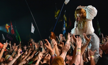 Florence Welch gets close to the Glastonbury crowd.