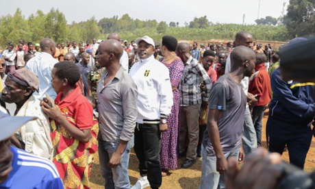 Pierre Nkurunziza stands in line to vote.