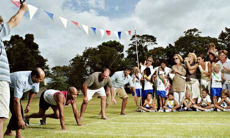 Fathers at starting line of on school sports day