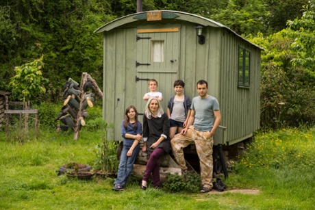 Tobias Jones with his wife Francesca and their children at Windsor Hill Wood.