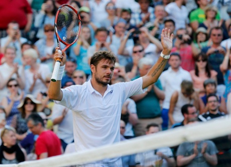 Stan Wawrinka celebrates after beating Joao Sousa.