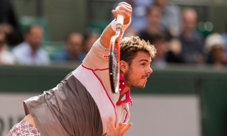 Stan Wawrinka let's a serve fly against Roger Federer in their quarter-final.