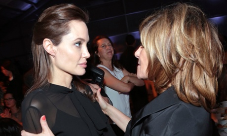 Former Sony Pictures co-chairman Amy Pascal greets Angelina Jolie, one of the Hollywood stars commented on in leaked emails from the studio.