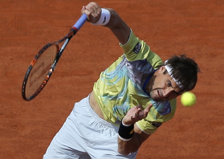 David Ferrer serves.