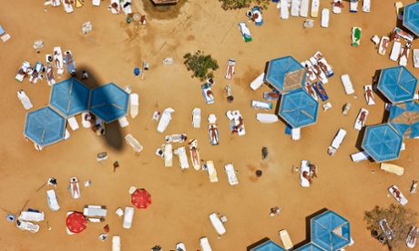 Women sunbathing in a walled-off nude beach at Ein Bokek.