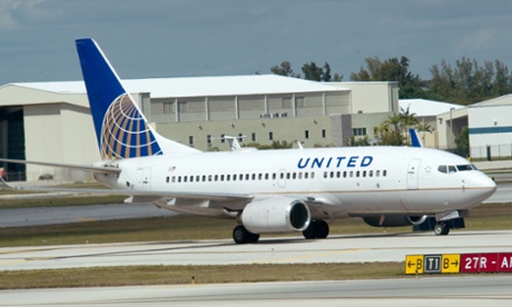 United Airlines says it is barring a worker who is accused of Islamophobia.