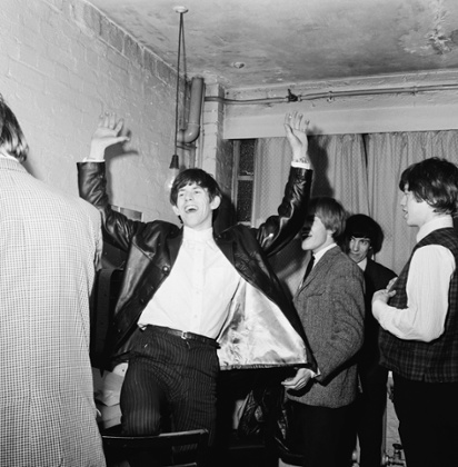 Young man blues … Keith Richards laughing with Mick Jagger, Brian Jones and Bill Wyman backstage during an early Rolling Stones tour, December 1963.